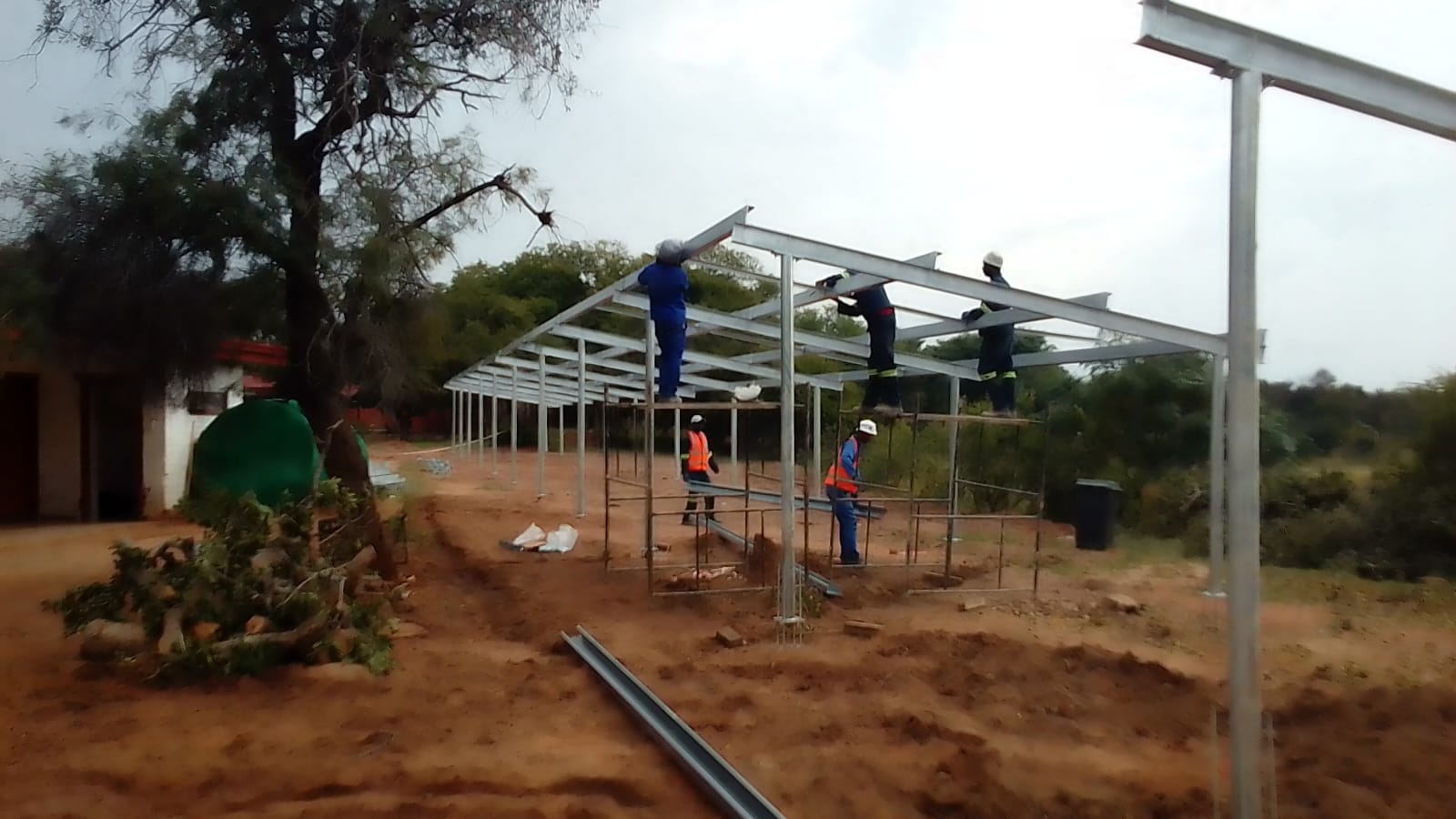 Completed solar carport providing shade and solar power